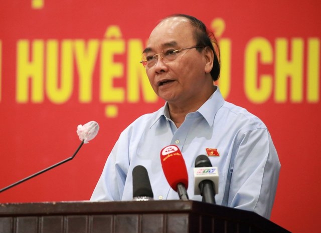 Chủ tịch nước Nguyễn Xuân Phúc phát biểu tại buổi tiếp xúc cử tri huyện Củ Chi - Ảnh: VGP